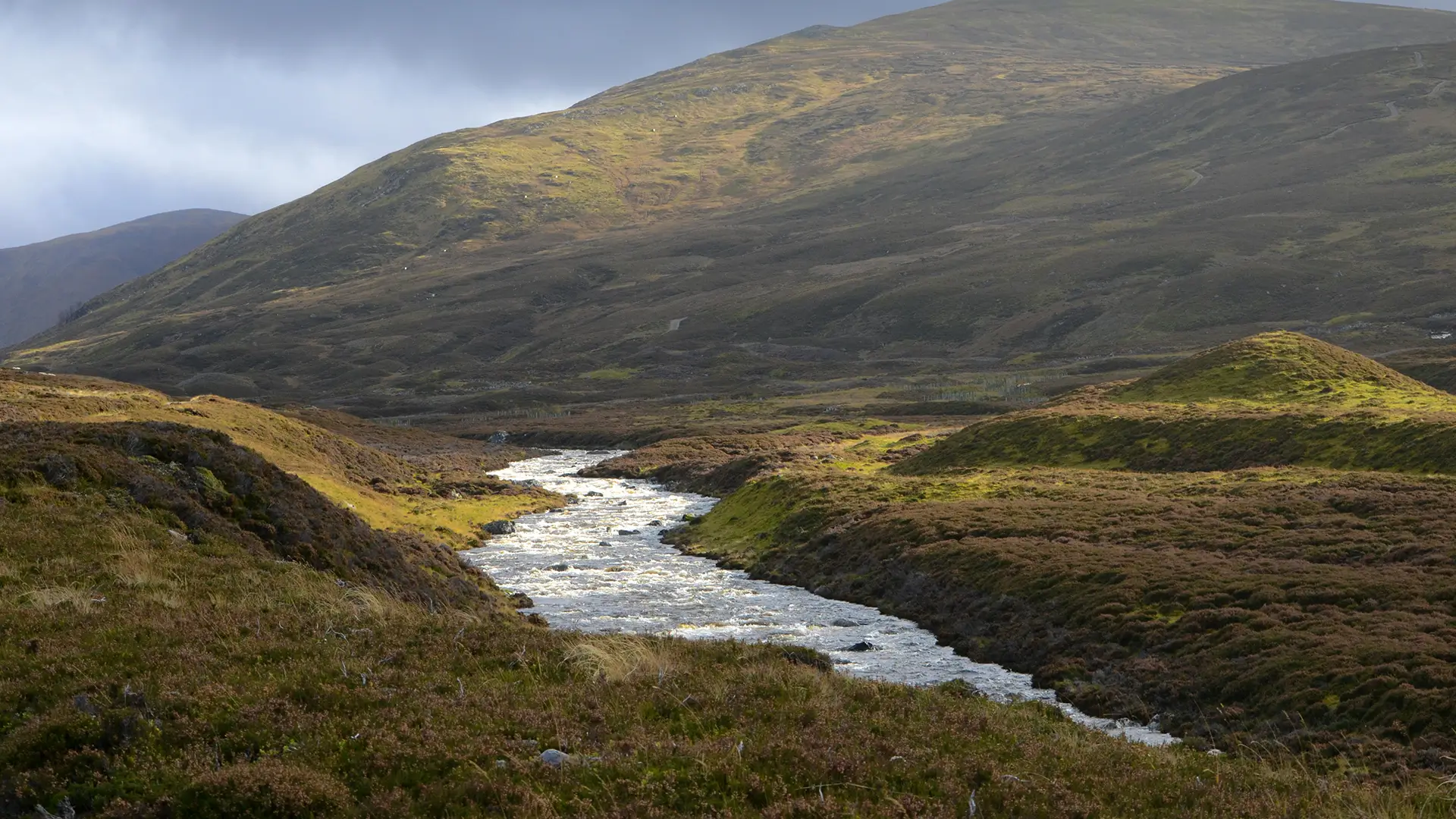 Speyside Highlands landscape with river valley and rolling hills