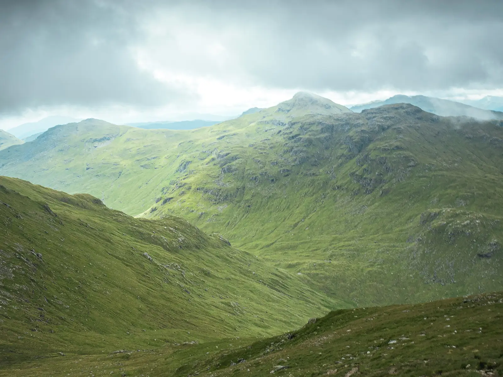 Misty green hills in the Speyside region of the Scottish Highlands