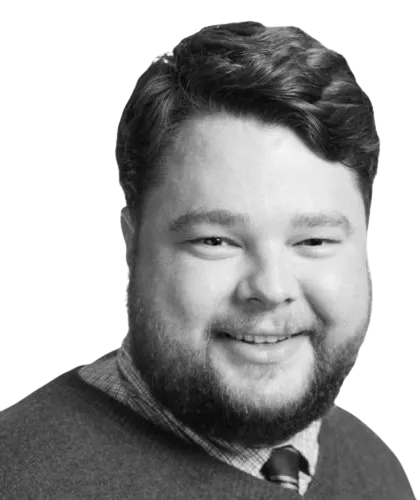 A portrait photograph of Jason A. Rogers, Principal Consultant and Solution Architect at Rogers West.