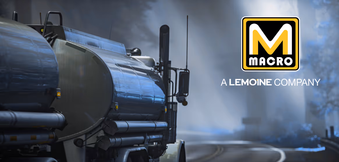 A fuel truck driving down the road