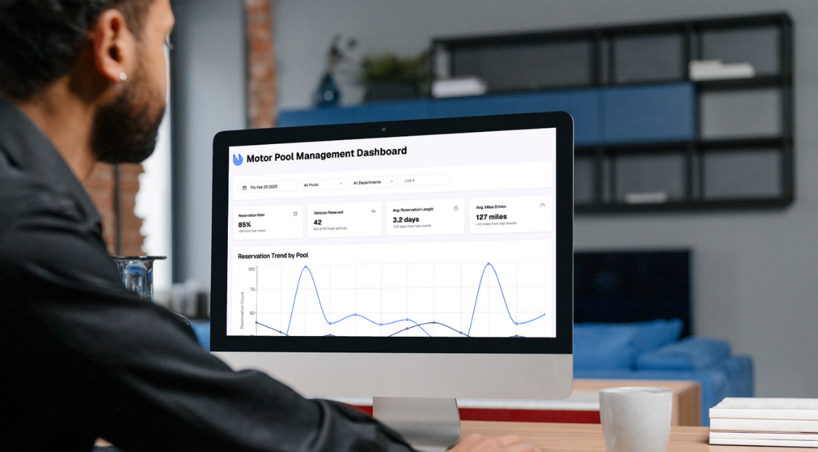 A man looking at a computer screen