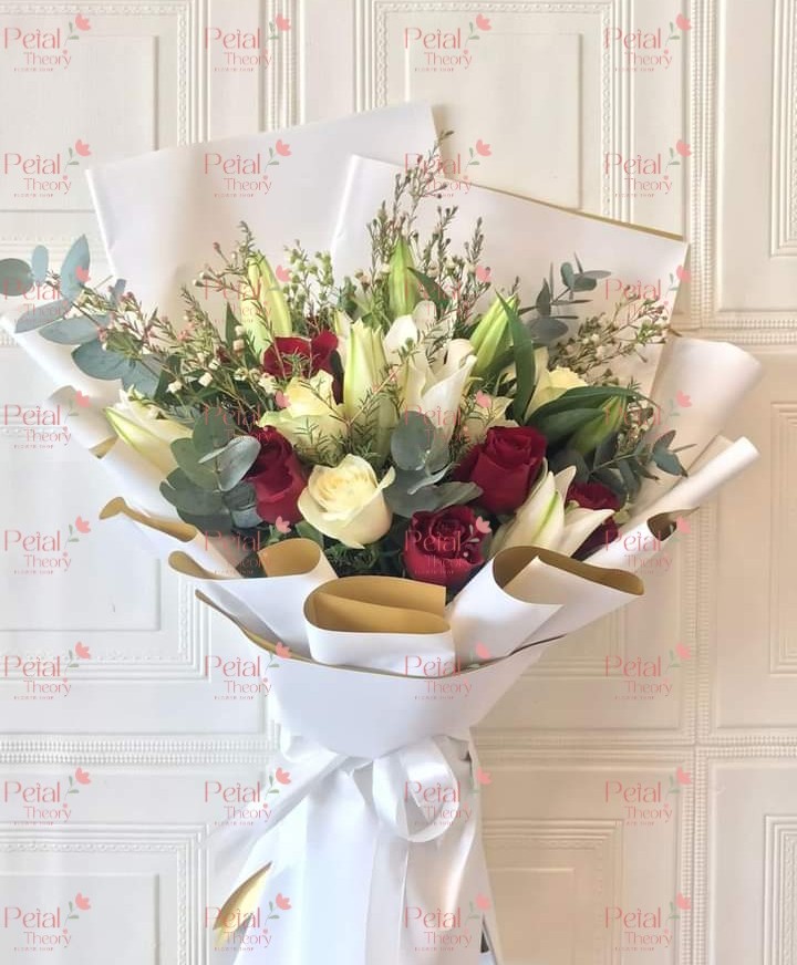 Bouquet of white lilies and roses