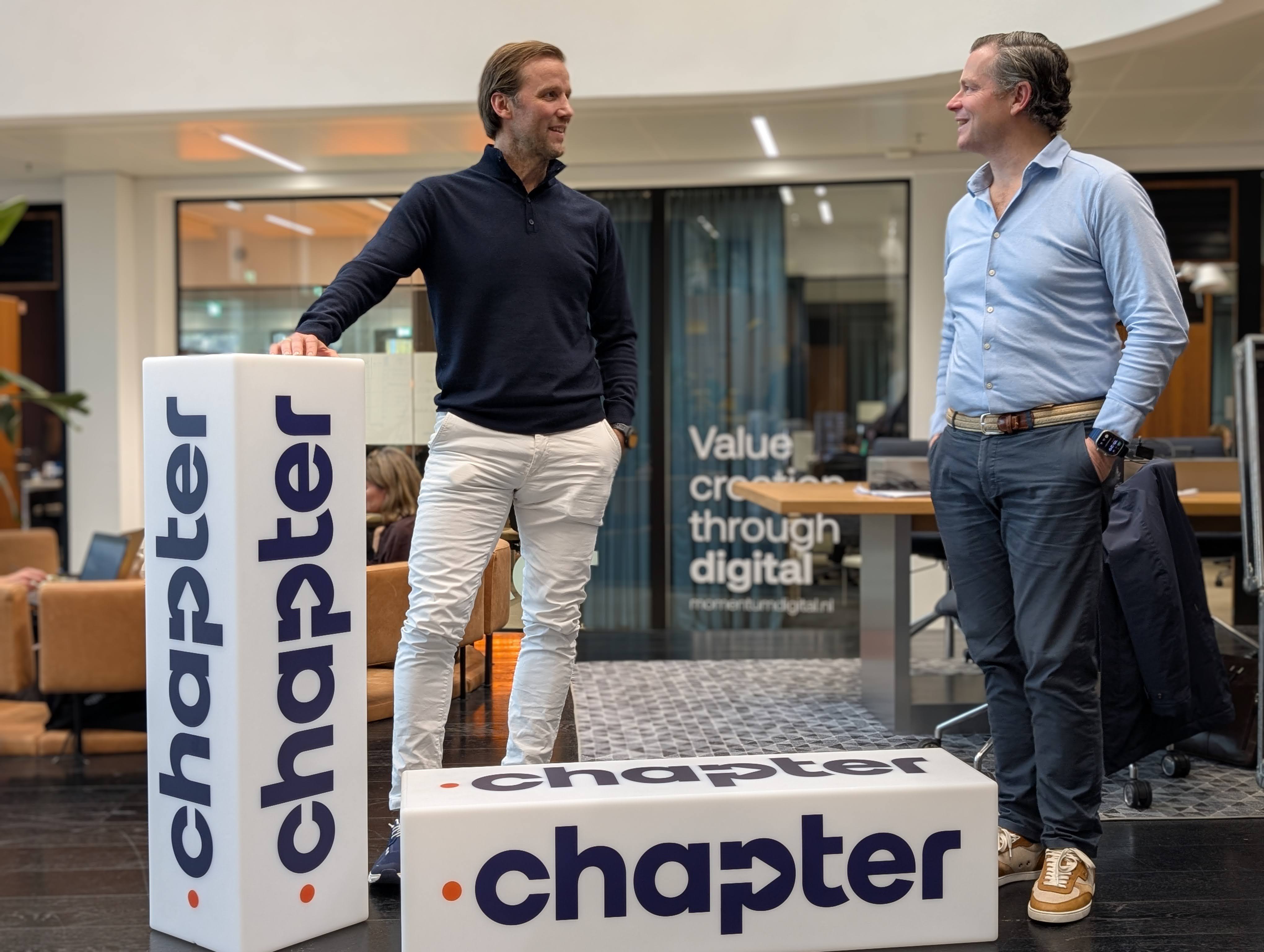 The team of Chapter sitting for their logo