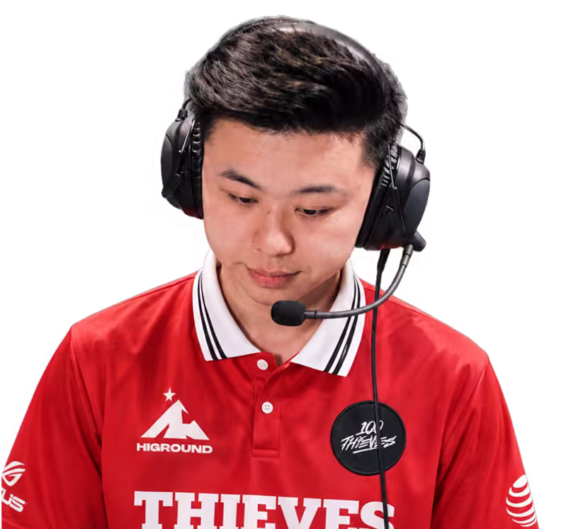 Professional Valorant player wearing a gaming headset and red team jersey