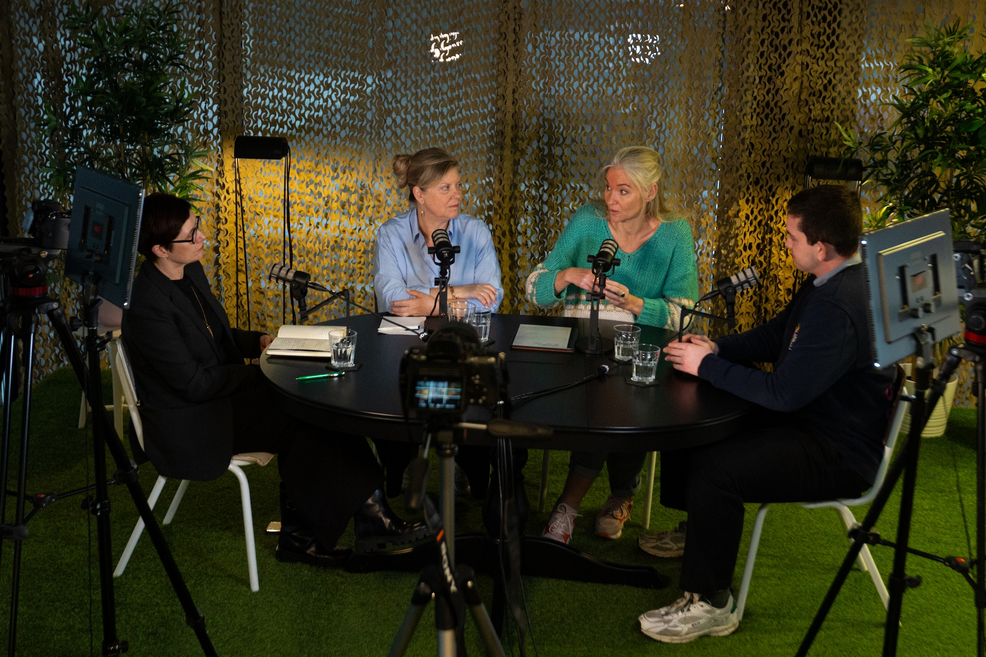 An old person looking off to the side with blue sky behind them