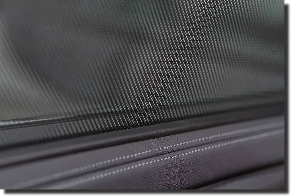 Automotive interior panel with carbon-fiber weave; example of types of carbon fiber for cars used on trims and dashboards