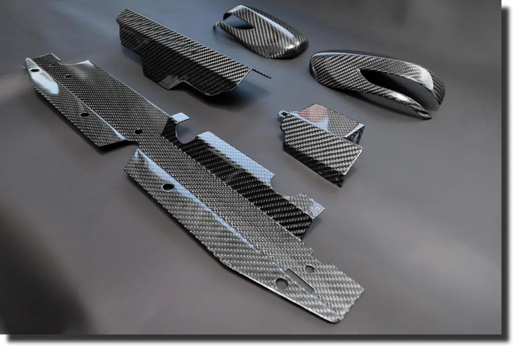 Finished carbon fiber automotive parts showing how prepreg carbon fiber supports high-performance components with repeatable quality.