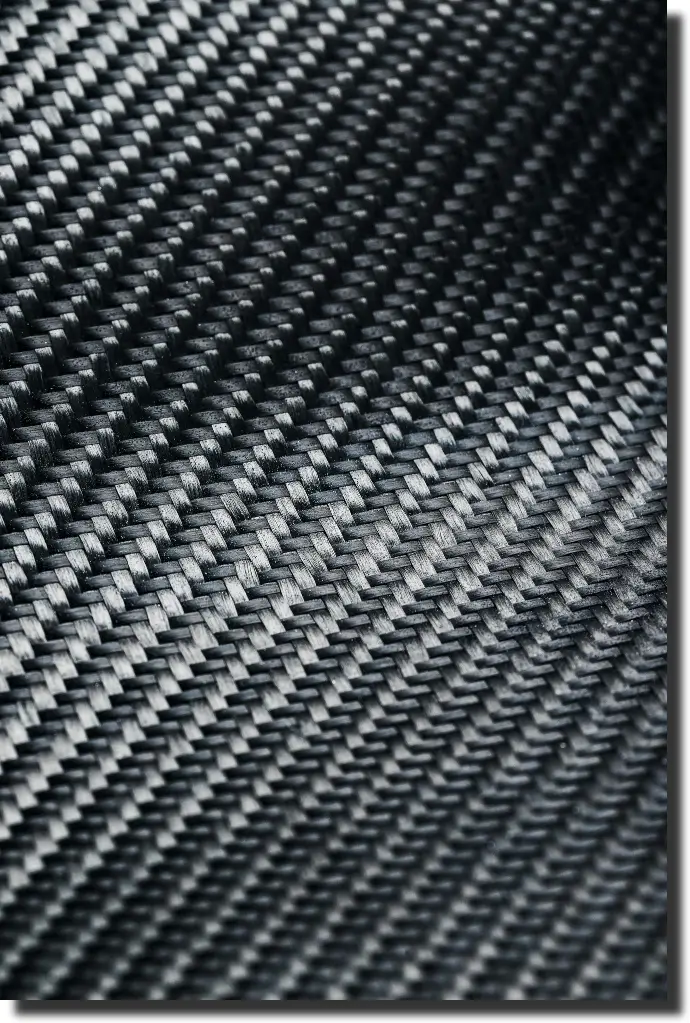 Close-up raw carbon fiber weave showing how surface texture affects carbon fiber coating and final finish