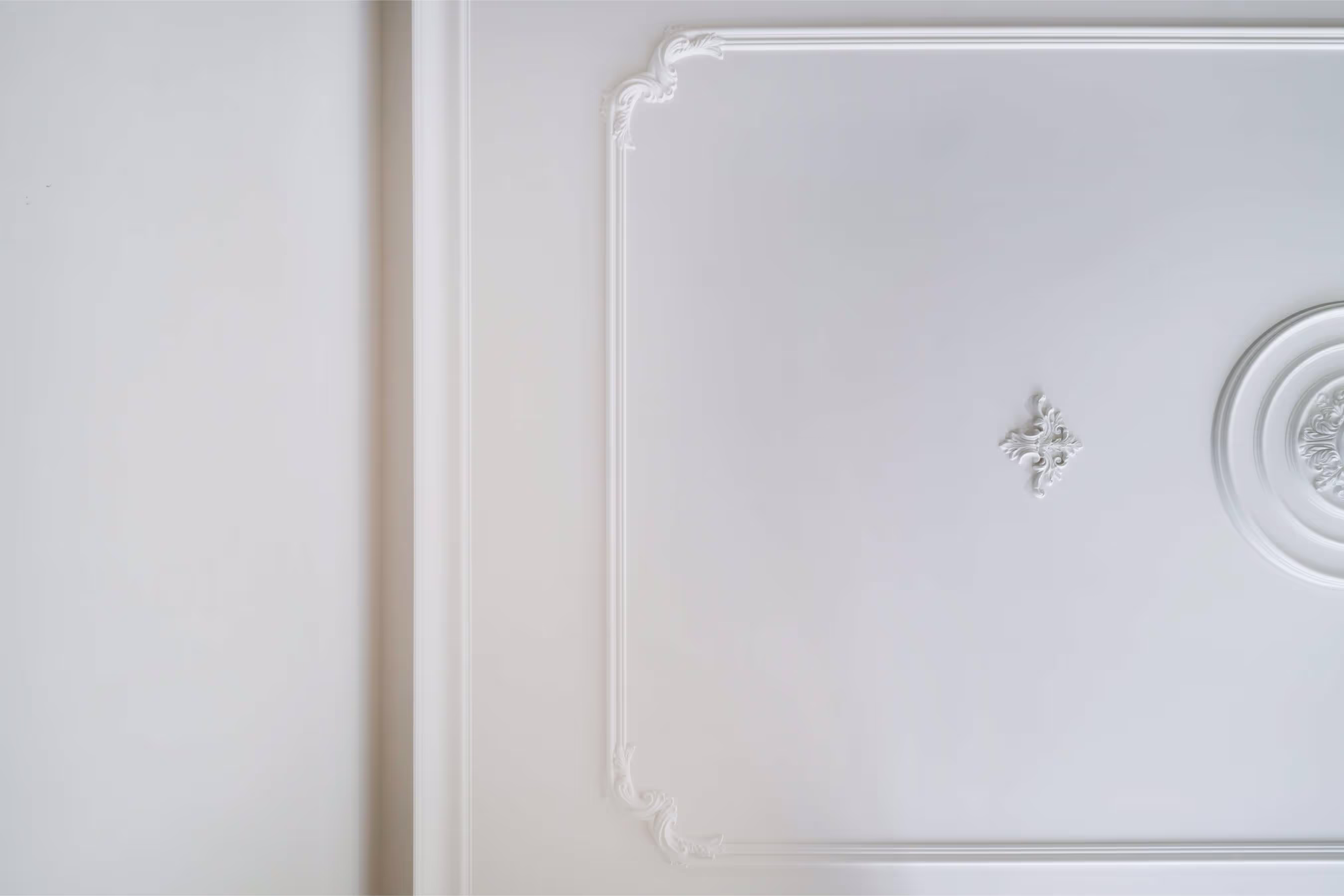 Photo of a white ceiling with a vent