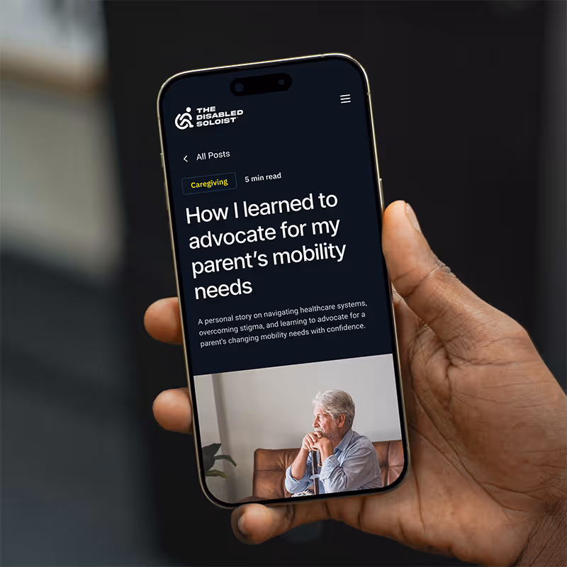 A mock up of a smart phone in someone's hand displaying a blog titled "How I learned to advocate for my parent's mobility needs".