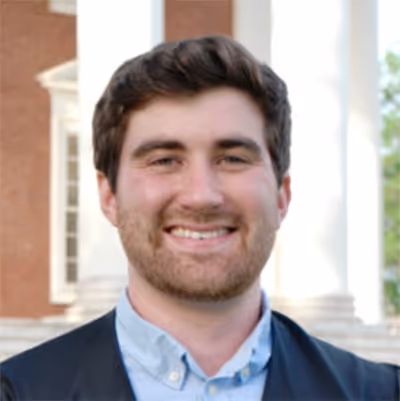 A professional headshot of Jamison Burks.