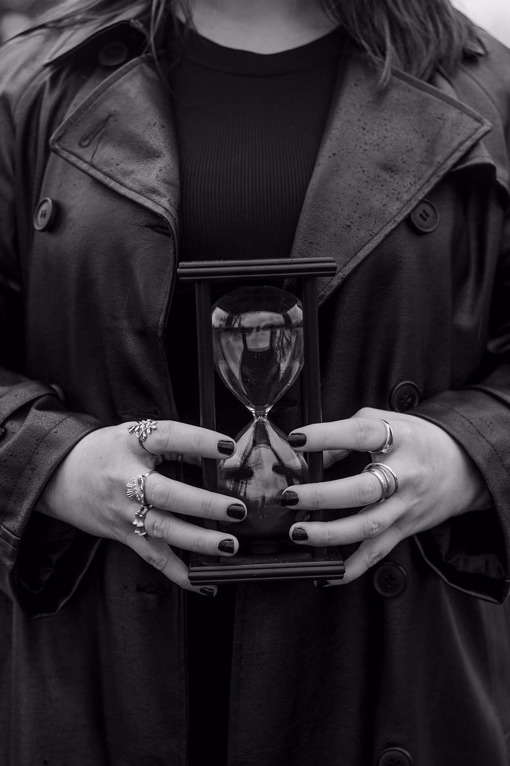 Hannah Hernandez holding an hourglass,