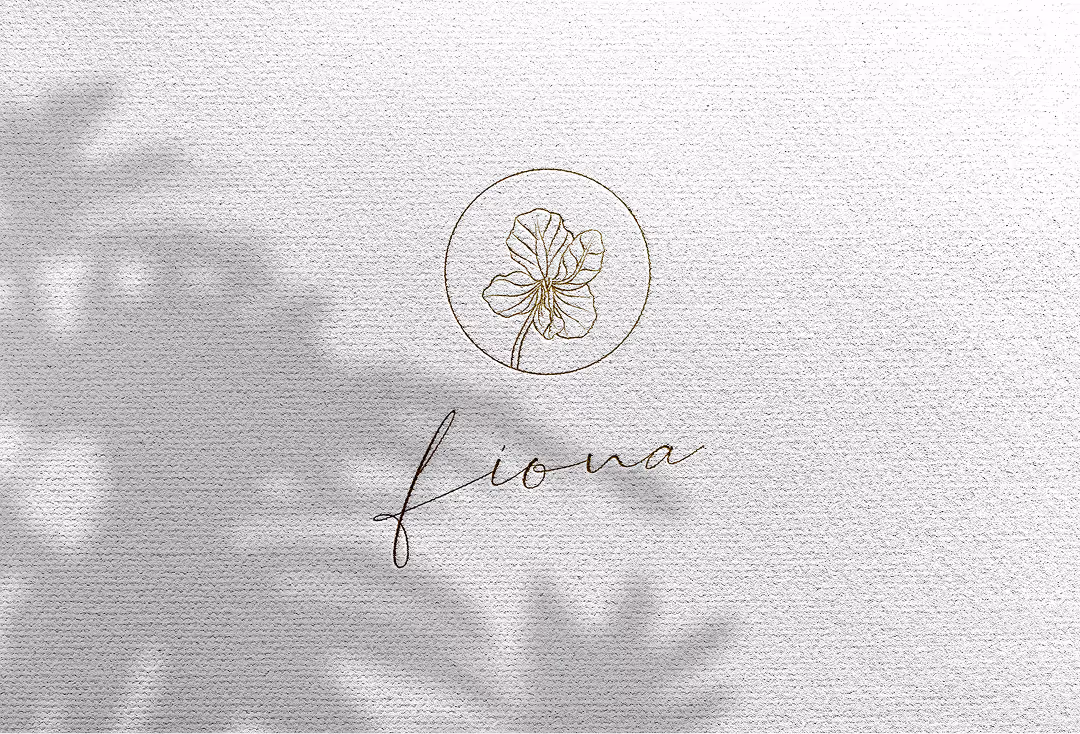 Fiona Whitson brand seal, which showcases Fiona's first name and a flower in a circle. This is created by EQBM Design Company.