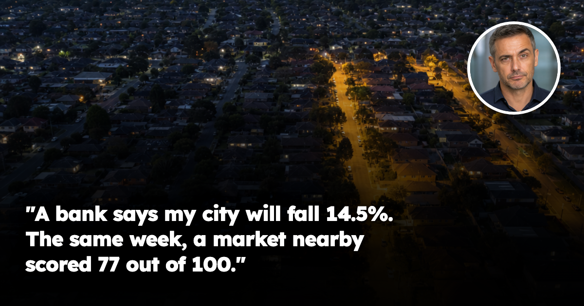 A wide aerial view of an Australian suburban street grid at dusk, with some streets brightly lit and others dark, illustrating how a single national price figure averages markets that are moving in opposite directions.