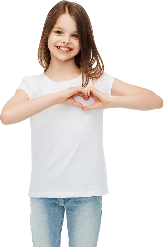 A young girl forms a heart shape with her hands, smiling joyfully against a bright background.
