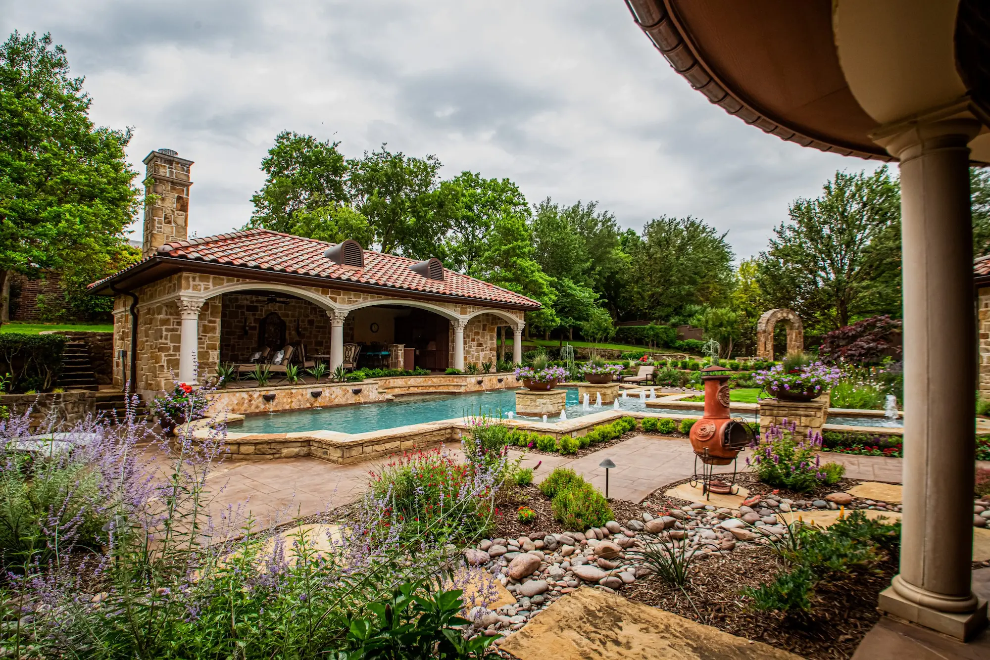 A serene pool and patio area featuring a charming gazebo, perfect for relaxation and outdoor gatherings.