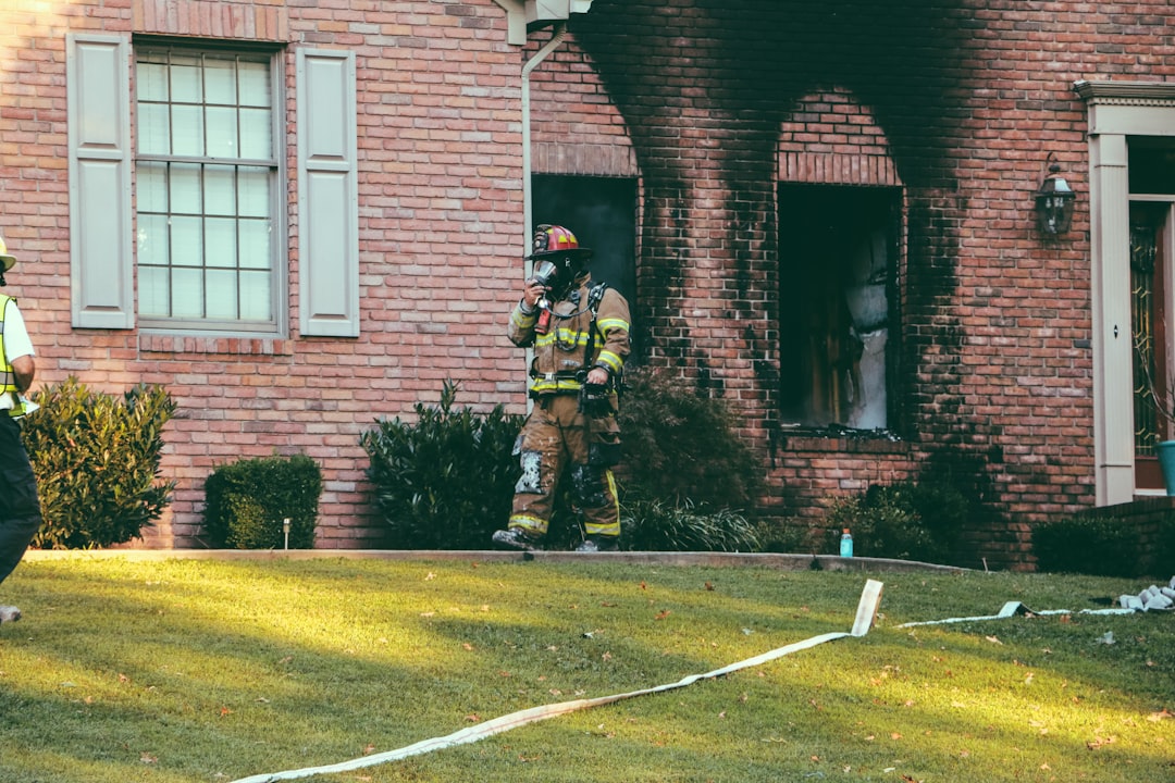 Image of a firefighter near a home - Dryer Vent Cleaning Company in Pittsburgh Image of a firefighter near a home - Dryer Vent Cleaning Company in Pittsburgh