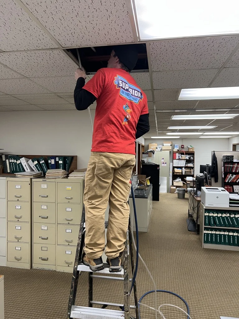 commercial HVAC ductwork and ventilation systems in an office building commercial HVAC ductwork and ventilation systems in an office building