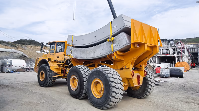 Modified Dump Trucks for Tunnel Segment Transport
