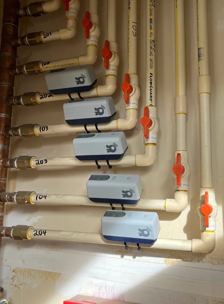 Non-invasive ultrasonic water submeter with cellular connectivity for easy installation without plumbers or Wi-Fi, helping recover water costs, detect leaks, and increase NOI