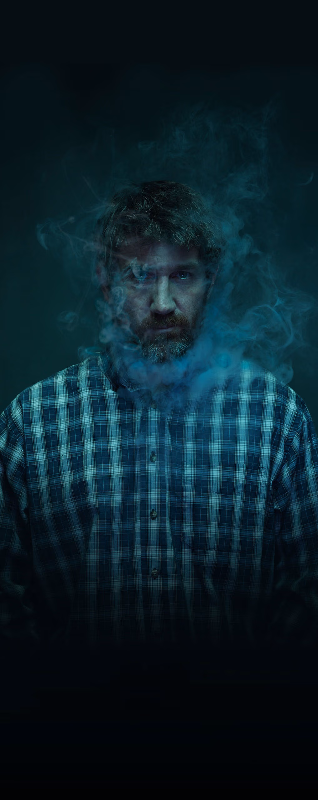 a man with smoke coming out of his head