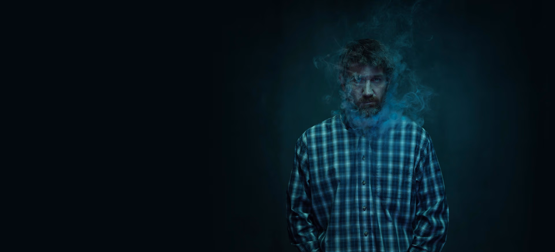 a man with smoke coming out of his head