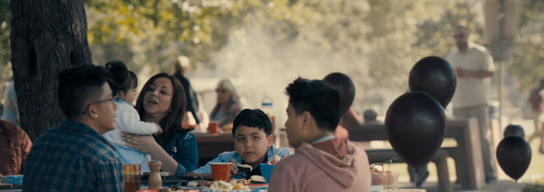 a group of people sitting at a table