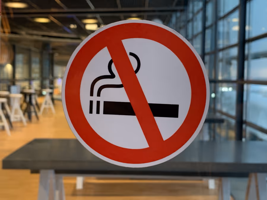 a sign on a glass wall