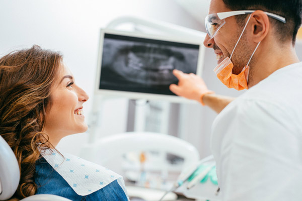 What Causes Exposed Teeth Roots
