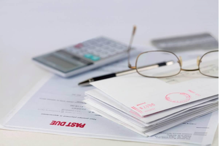 debt collection letters with red stamp that reads past due