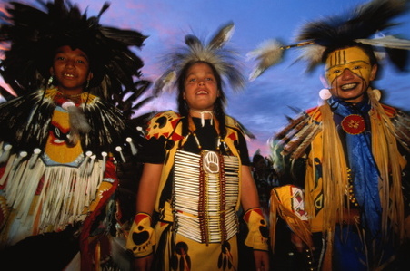 NAYA staff member portrait showing professional Native American team member in workplace setting