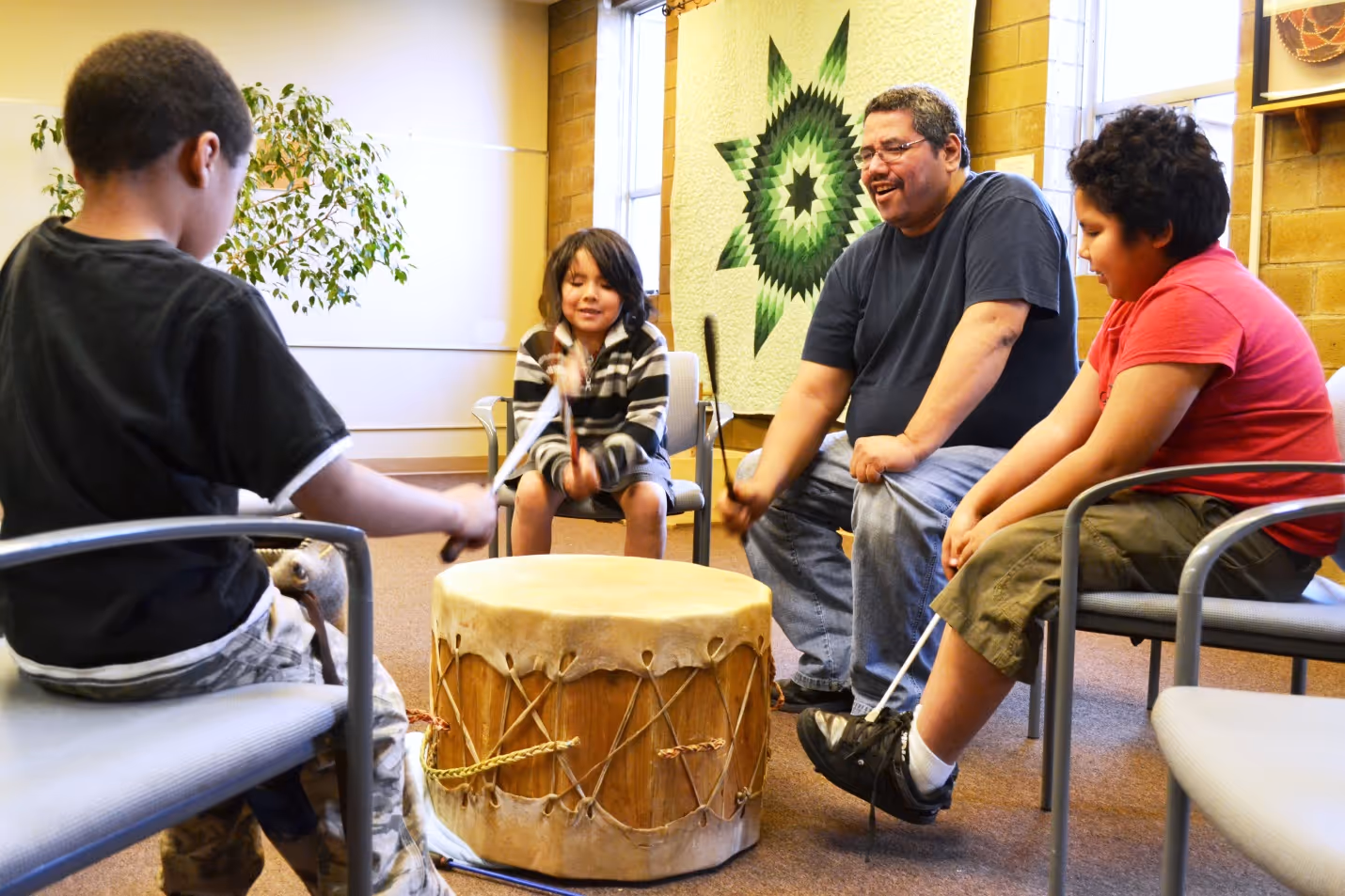 Gathering in the early 1960’s, Native American families that were relocated to Portland or looking for work after World War II began to find one another and started meeting in homes, parks and church halls to share stories and traditions. Although they came from different tribal backgrounds they quickly determined that they needed to begin to teach their young children these traditions, culture, spirituality and the Native way of life. Formalizing in 1969 as the first Native American non-profit in the Portland area, the Bow & Arrow Culture Club (BACC) began weekly Gatherings where singing, drumming, dancing, potlucks, and other traditions could be shared and taught. In 1986, BACC gained the right to plan and coordinate the Annual Delta Park Powwow and Encampment, which began in 1970 and was previously managed by various groups. BACC has hosted the annual gathering since 1986 and has focused the theme on sobriety and community. BACC continues weekly Friday Night Gatherings at NAYA, with potlucks, drumming, dancing and other cultural sharing. Many families have held traditional naming ceremonies, first-kill ceremonies and other Native traditions at the Friday Night Gatherings. See the schedule on our Web Calendar.