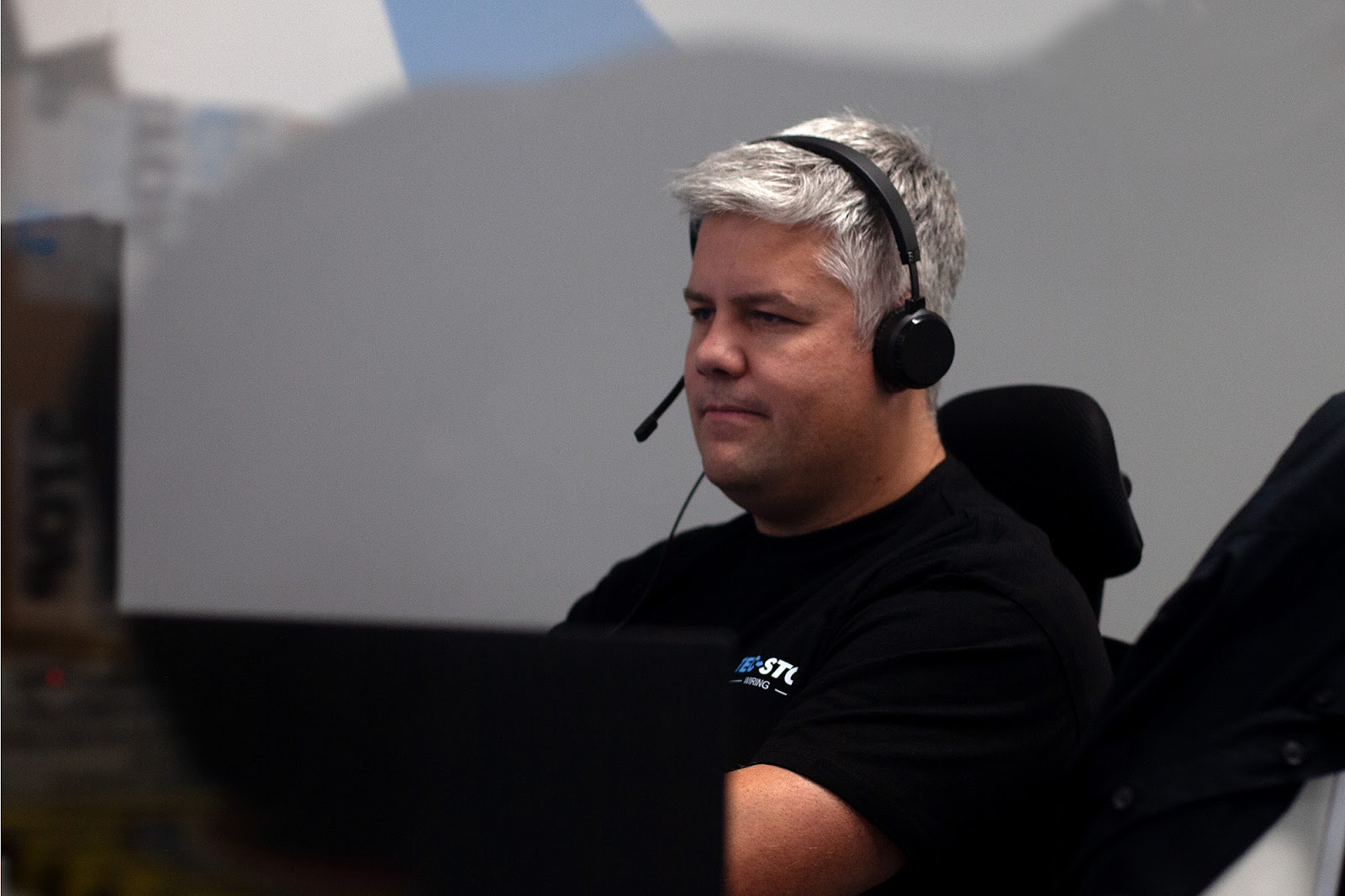 Sam, Managing Director of Tec‑Stop, providing support during a client consultation