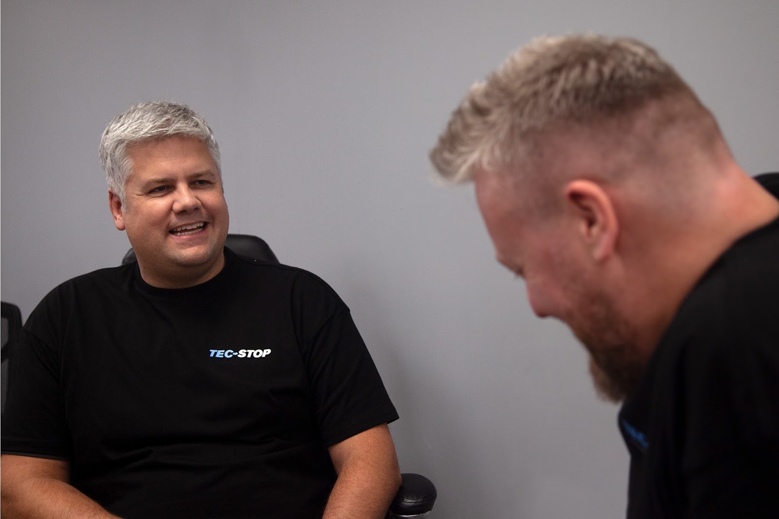 UK wiring harness supplier team Sam Stiley and Steve Davies discussing manufacturing requirements and collaborative engineering solutions