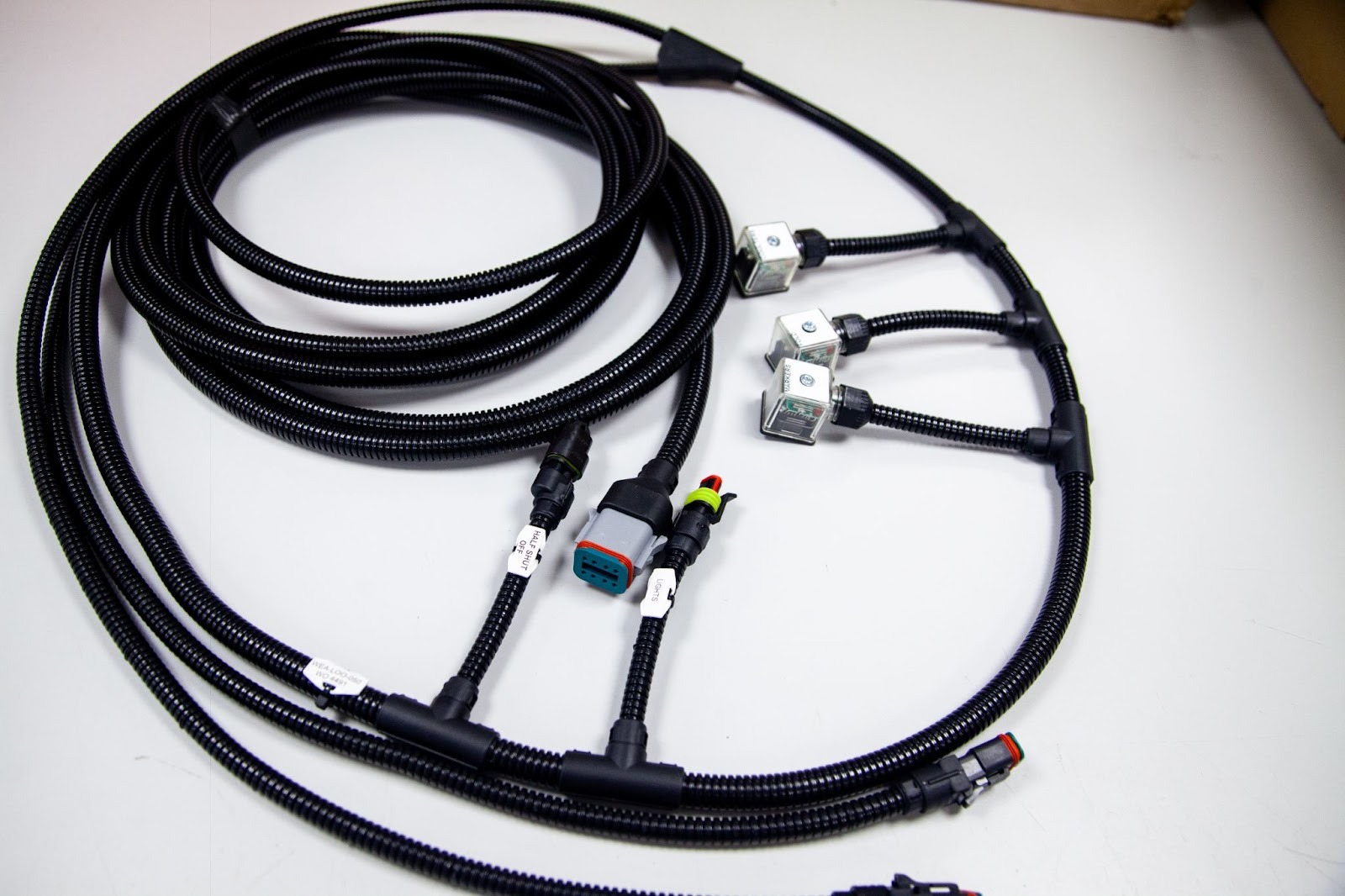 Custom wiring harness assembly with multiple connectors, built by a UK wiring harness manufacturer for OEM and industrial applications