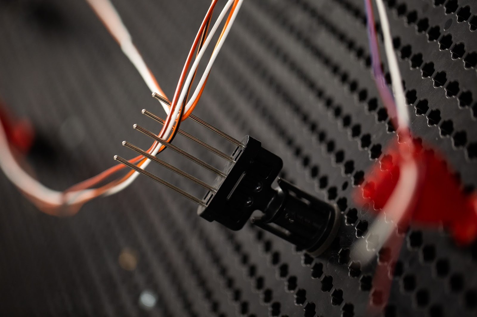 A wiring harness controls routing, protection and connection points, reducing installation time and wiring errors.