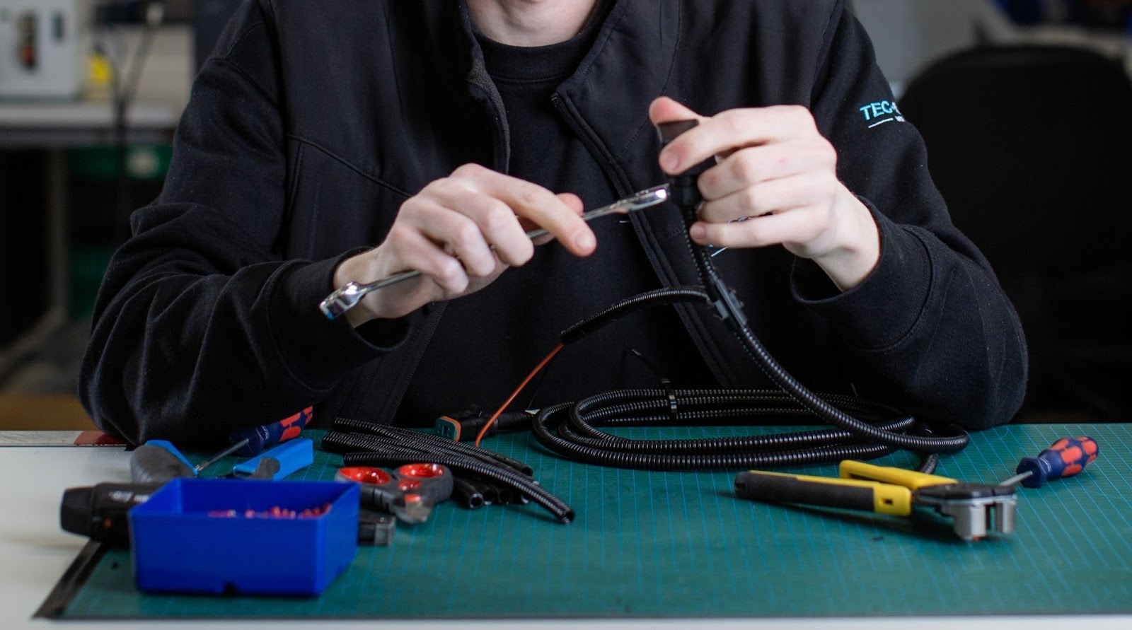 Wire harness assembly process supporting efficient installation and repeatable OEM production