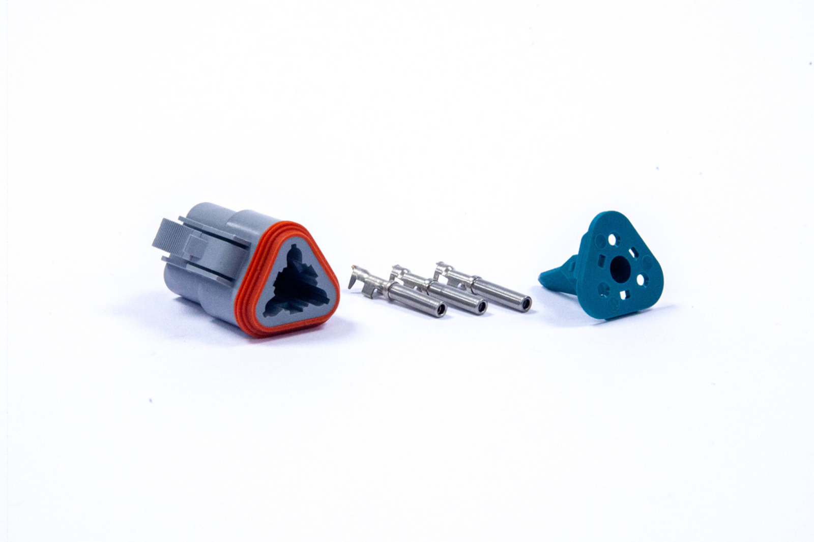 Automotive sealed electrical connector components including terminals and housing used in wiring harness assemblies
