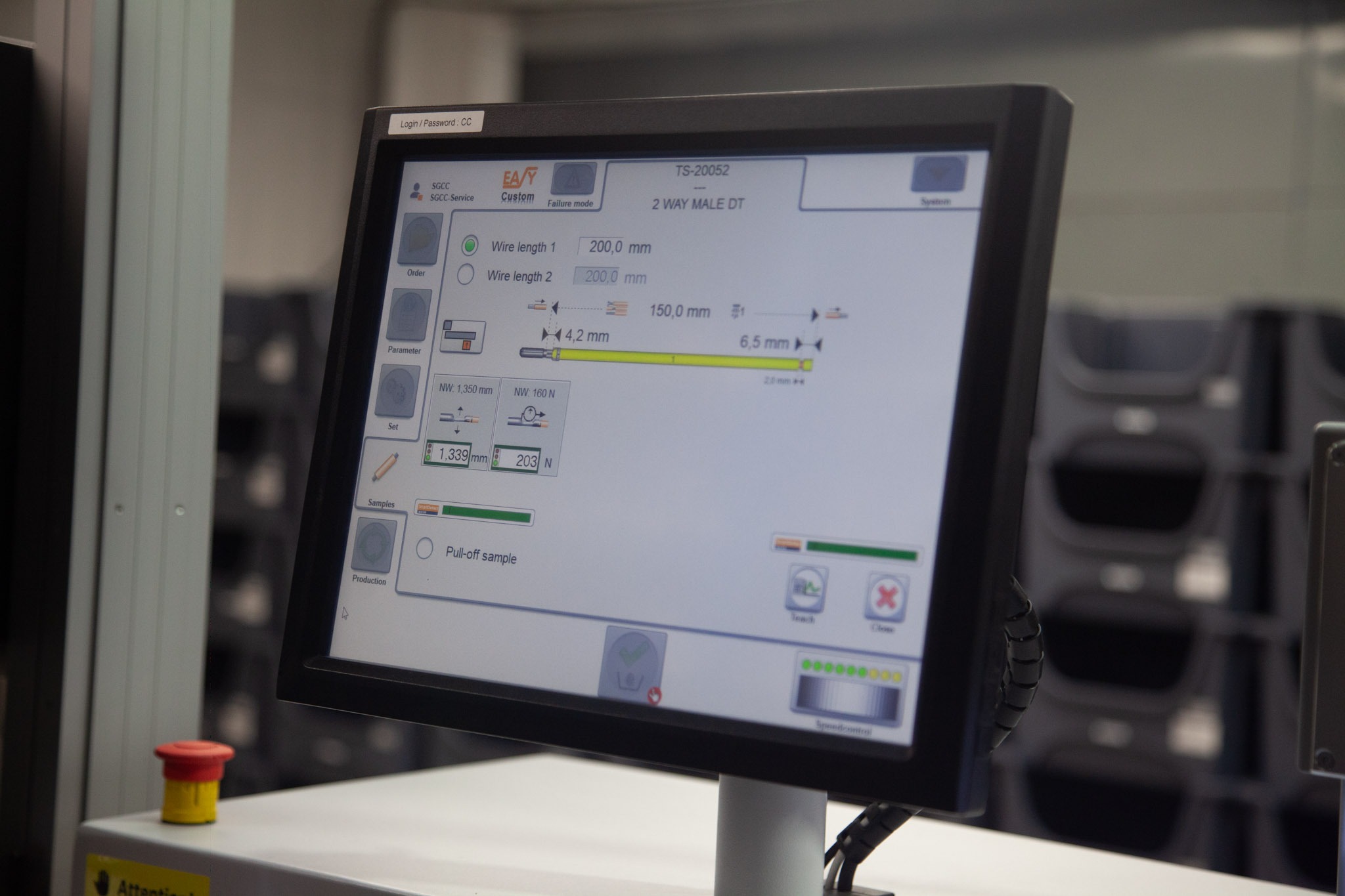 Automated cable processing machine interface showing wire length and termination settings for cable assembly production