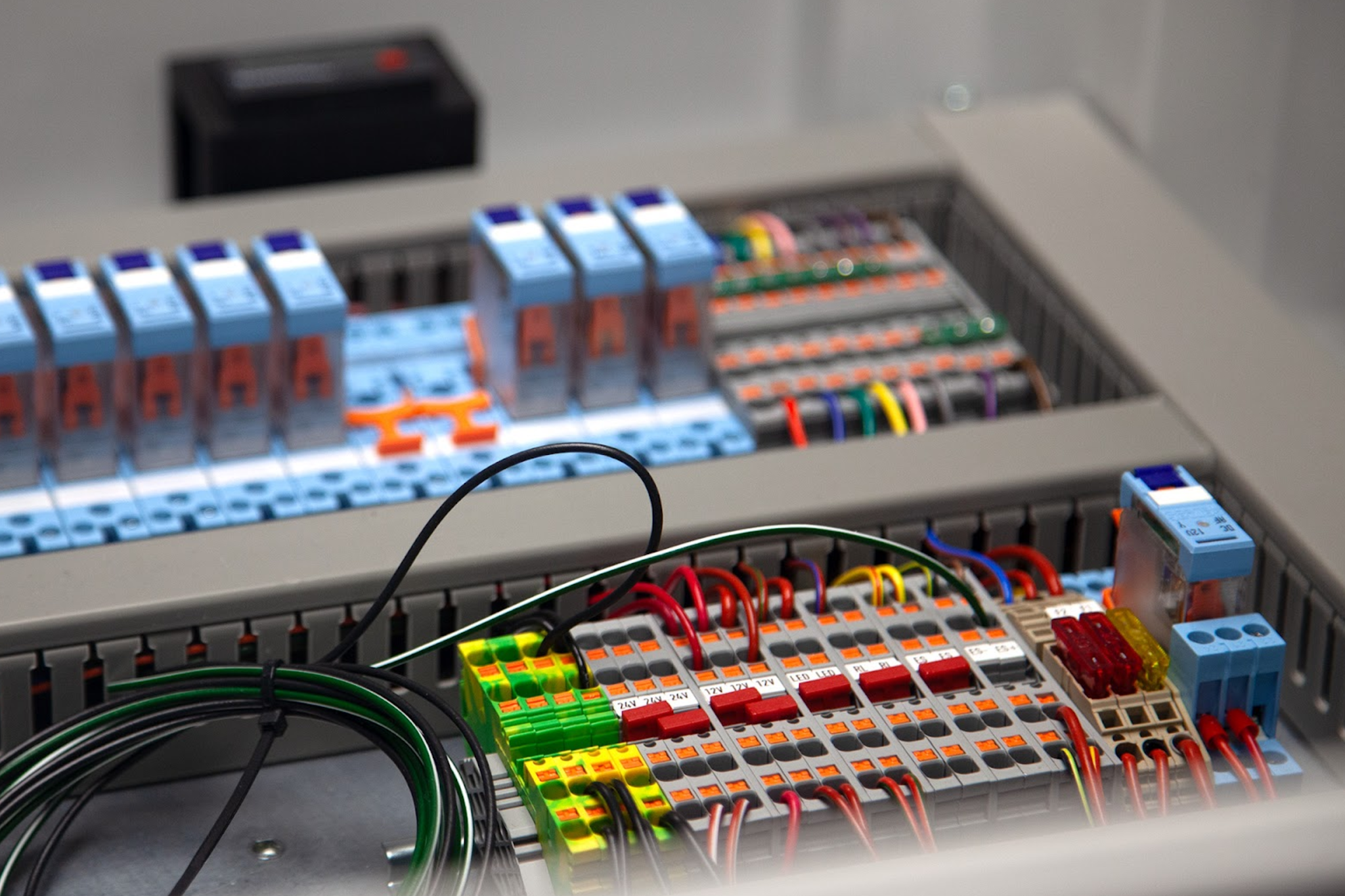 Electrical control panel wiring and terminal connections during panel testing and verification