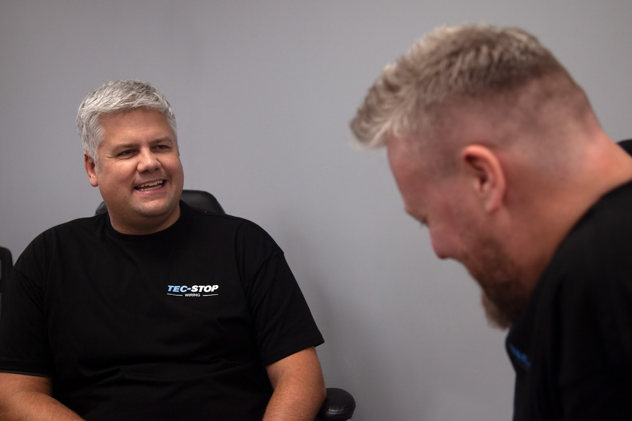 Tec-Stop managing director Sam Stiley and digital director Steve Davies discussing electrical panel testing and OEM manufacturing support