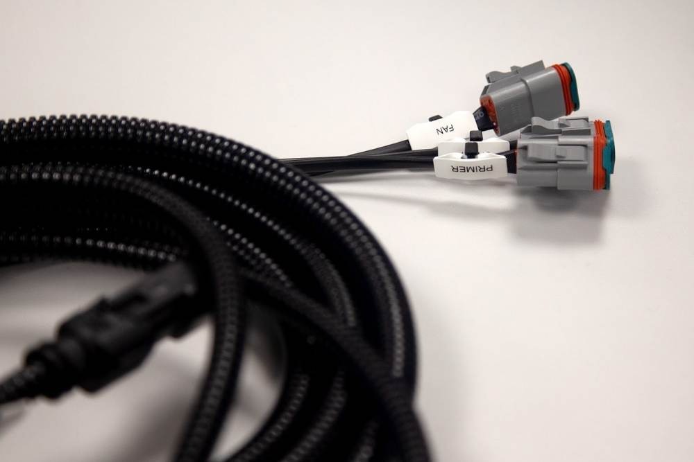 Deutsch connector wiring harness with protective braided sleeving for vehicle applications
