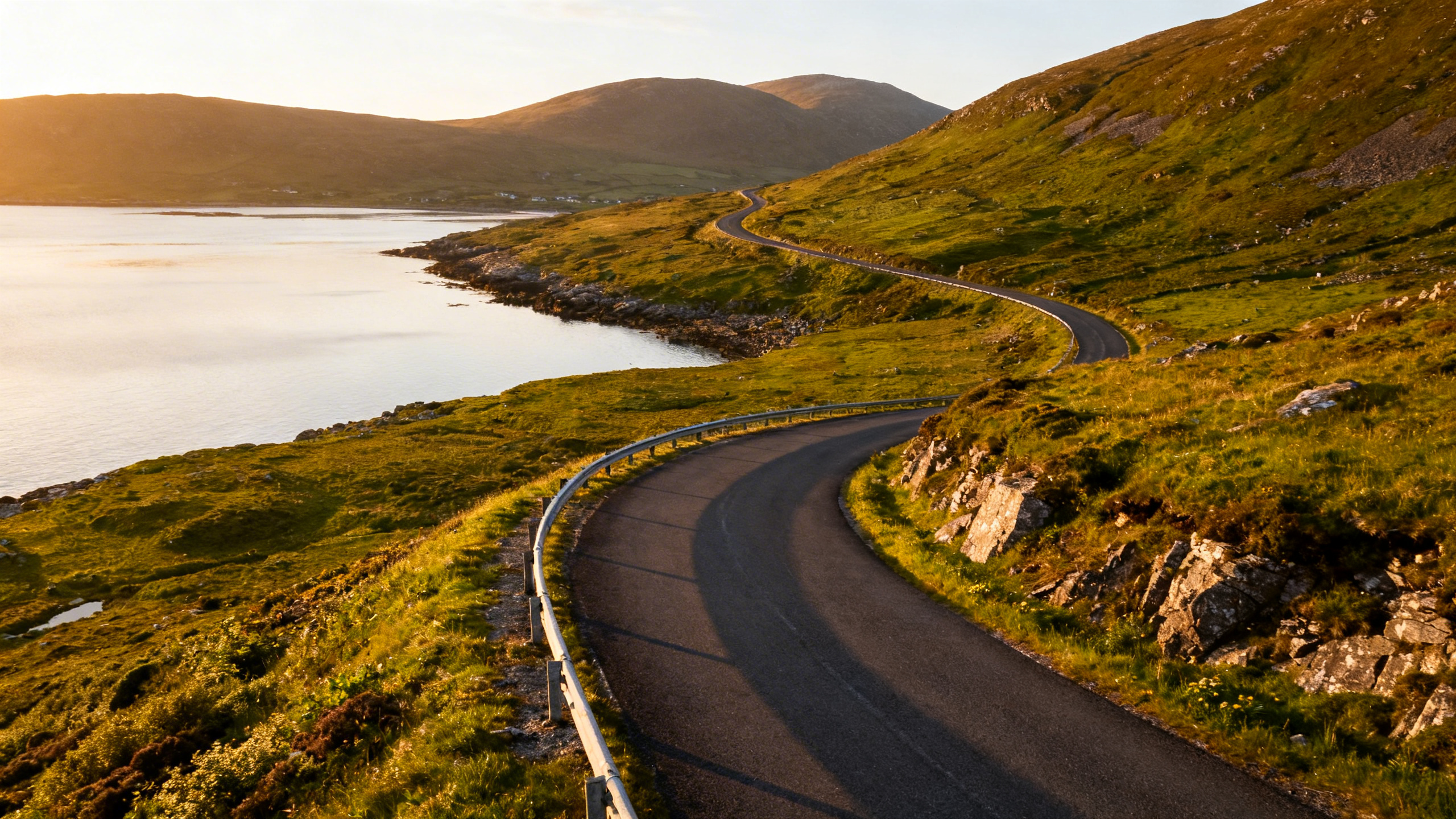 Sky Road above Clifden Bay, afternoon light on the Atlantic inlet below