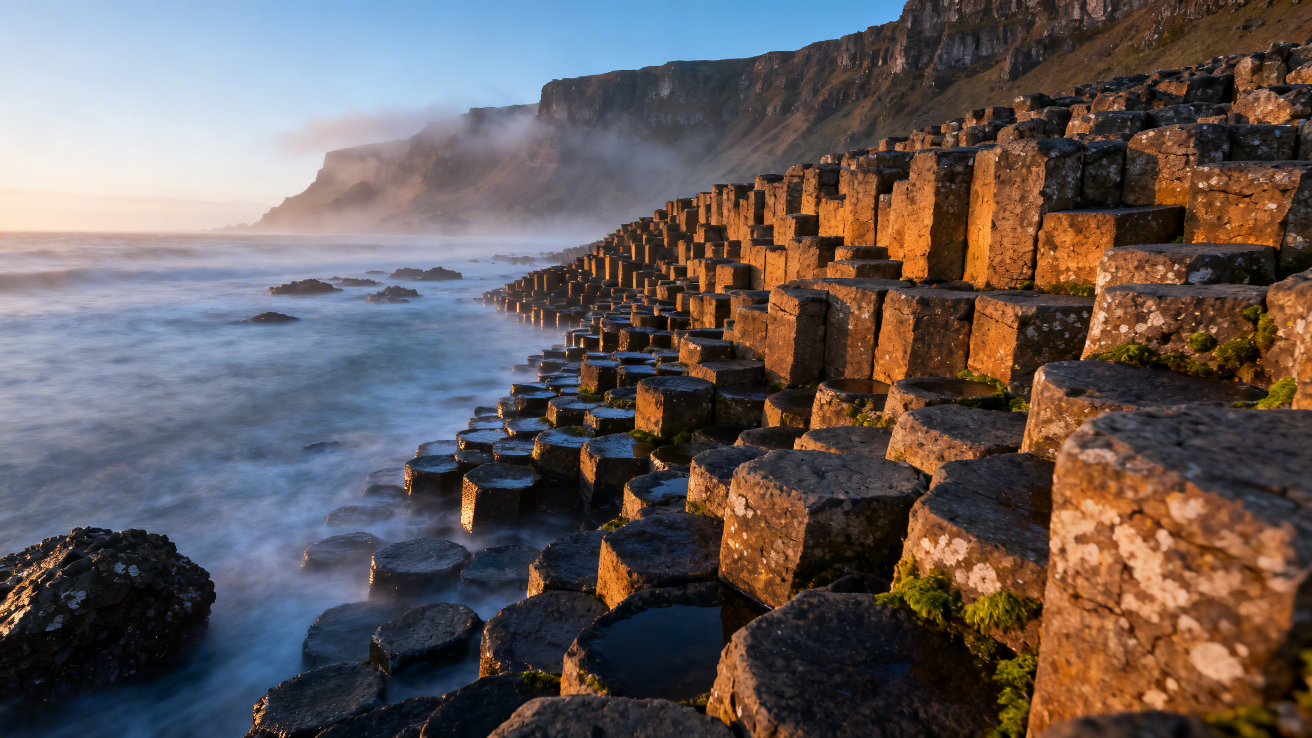 Giant's Causeway hexagonal basalt columns at dawn, County Antrim, Northern Ireland