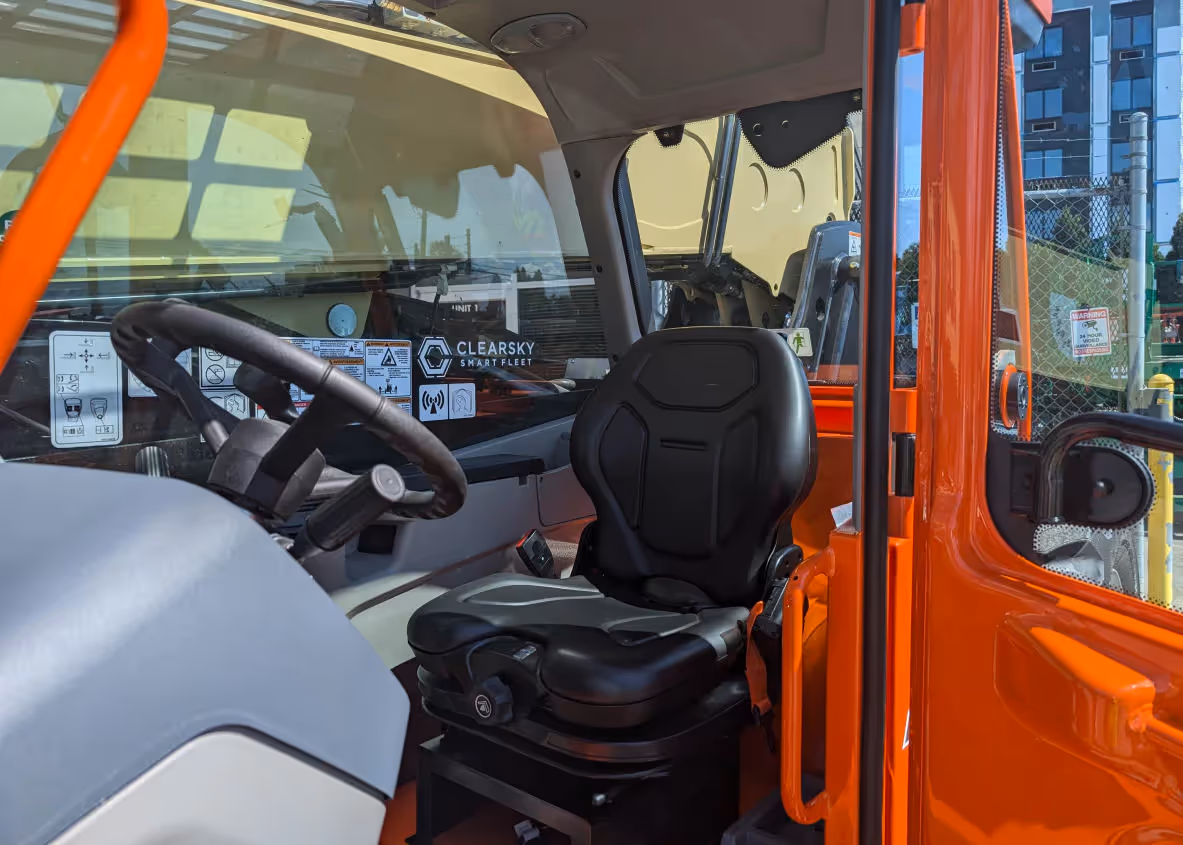 Operator cab interior of JLG 742 telehandler with visible seat and controls in Canada