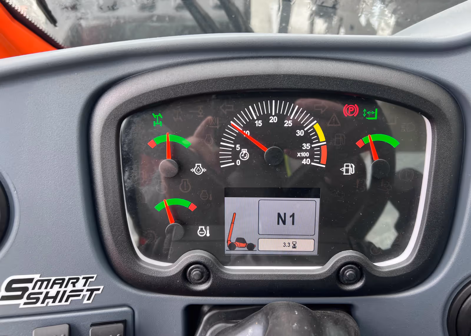 JLG 742 telehandler dashboard showing SmartShift gauge cluster in Canada