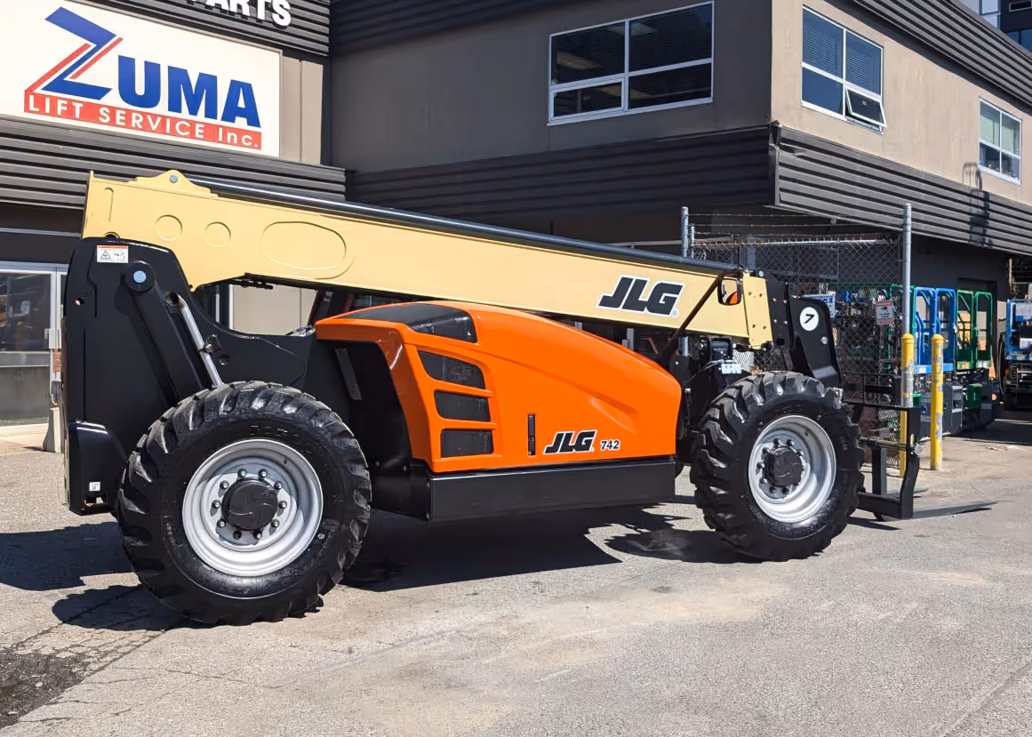Rear side view of JLG 742 telehandler showing boom and counterweight in Canada