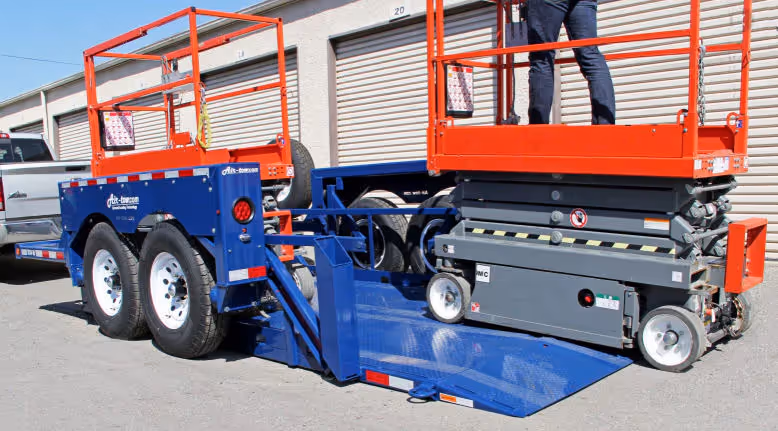 Airtow UT14-10 drop deck trailer loading scissor lift in Canada