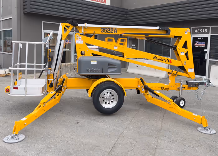 Haulotte 3522A boom lift with stabilizers deployed in Canada