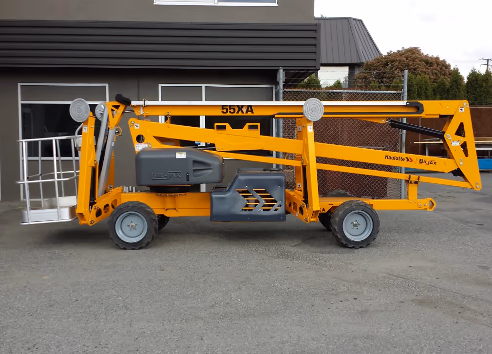 Haulotte 55XA articulating boom lift side profile with compact wheels in Canada